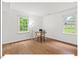 Bright home office featuring hardwood floors and view to backyard at 216 Brook Ln, Durham, NC 27712