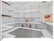 Pantry with multiple shelves for organized food storage and an assortment of snacks at 216 Brook Ln, Durham, NC 27712
