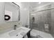 Cozy bathroom with modern fixtures, a walk-in shower, and a white ceramic tile backsplash at 2634 Turner Pines Dr, New Hill, NC 27562