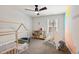 Playful ' bedroom with a fun bed frame, teepee, and color block accent wall for a cozy space at 2634 Turner Pines Dr, New Hill, NC 27562