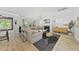 Inviting living room boasts natural light, a cozy fireplace, and contemporary decor for comfortable living at 2634 Turner Pines Dr, New Hill, NC 27562