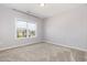 A bedroom offering a neutral color palette, plush carpeting, and a window for natural light at 2885 Farmhouse Dr, Apex, NC 27502