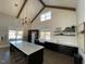 Features a kitchen island with modern pendant lighting, and stainless steel appliances at 2885 Farmhouse Dr, Apex, NC 27502