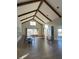 Spacious meeting room with tall ceilings, wood beams, and an abundance of windows at 2885 Farmhouse Dr, Apex, NC 27502