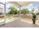 Cozy screened-in porch with views of the lush backyard and serene surroundings at 2885 Farmhouse Dr, Apex, NC 27502