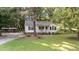 Charming single-story home with a inviting front porch, landscaped front yard, and picturesque curb appeal at 300 Plantation Rd, Clayton, NC 27520