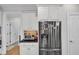 Kitchen includes stainless steel fridge and oven with adjacent breakfast nook at 3007 Krogen Ct, Creedmoor, NC 27522