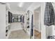 Walk-in closet with built in shelving and hanging storage at 3007 Krogen Ct, Creedmoor, NC 27522