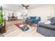 Bright and airy living area open to the dining and kitchen spaces at 3025 Creek Moss Ave, Wake Forest, NC 27587