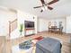 Open-concept living area with hardwood floors and neutral paint colors at 3025 Creek Moss Ave, Wake Forest, NC 27587