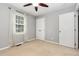 Bedroom with neutral walls and carpet and fan at 305 Burkwood Ln, Raleigh, NC 27609