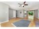 Spacious living room featuring hardwood floors and a ceiling fan at 305 Burkwood Ln, Raleigh, NC 27609