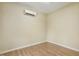 Neutral bedroom with updated flooring, and split unit A/C at 310 Cross Lake, Fuquay Varina, NC 27526
