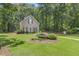 Charming home featuring tidy landscaping and classic architectural details surrounded by mature trees at 310 Cross Lake, Fuquay Varina, NC 27526