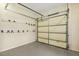 The garage has a gray floor and hooks for tool storage at 310 Cross Lake, Fuquay Varina, NC 27526