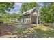Spacious garage with multiple bays and a covered parking area, providing ample storage and functionality at 310 Cross Lake, Fuquay Varina, NC 27526