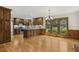 Spacious kitchen with custom wood cabinets, stainless appliances, and scenic window views at 310 Cross Lake, Fuquay Varina, NC 27526