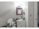 Bathroom featuring a vanity, mirror, and essential fixtures in a functional layout at 313 Colleton Rd, Raleigh, NC 27610