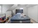 Bedroom featuring an accent wall, natural light, and a sleeping space at 313 Colleton Rd, Raleigh, NC 27610