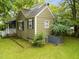Side and rear view of home with an air conditioning unit visible at 313 Colleton Rd, Raleigh, NC 27610
