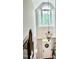 Grand foyer with large windows, chandelier, and high ceilings, creating a welcoming entrance at 327 Beavertail Rd, Henderson, NC 27537