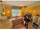 Kitchen with a window over a sink, wood cabinets, and stainless steel appliances at 327 Beavertail Rd, Henderson, NC 27537