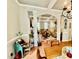 Open floor plan featuring hardwood floors, arched doorway and coffered ceilings at 327 Beavertail Rd, Henderson, NC 27537