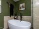 This is a modern bathroom with a freestanding tub and glass shower at 3507 Portico Ln, Durham, NC 27703