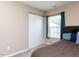 This bedroom features a large window and closet for ample storage at 3507 Portico Ln, Durham, NC 27703