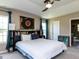 Primary bedroom with carpet flooring, trey ceiling, ceiling fan, and an abundance of natural light at 3507 Portico Ln, Durham, NC 27703