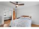 Comfortable bedroom with closet and wood floors at 3515 Luna Ln, Durham, NC 27705