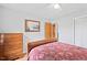 Bright bedroom with a ceiling fan and a warm and inviting atmosphere at 3515 Luna Ln, Durham, NC 27705