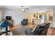 Open-concept living room with hardwood floors flowing into an eat-in kitchen, creating a comfortable space at 3515 Luna Ln, Durham, NC 27705