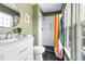 Updated bathroom with shower, updated tiles, and modern sink at 3634 Ranbir Dr, Durham, NC 27713