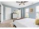 Spacious bedroom with large windows and a modern dresser at 3634 Ranbir Dr, Durham, NC 27713