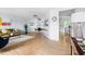 Open-concept living and dining area with hardwood floors and modern decor at 3634 Ranbir Dr, Durham, NC 27713