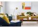 Cozy living room with a comfortable sofa, elegant decor, and a welcoming ambiance at 3634 Ranbir Dr, Durham, NC 27713