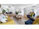 Spacious living area connecting to dining and kitchen with hardwood floors and modern design at 3634 Ranbir Dr, Durham, NC 27713