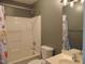 Cozy bathroom features a shower-tub combo with fun shower curtain and a single sink vanity at 3803 Ridgewood Dr, Franklinton, NC 27525