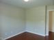 Bright bedroom featuring neutral walls, hardwood floors, and natural light, ready for personal touches at 3803 Ridgewood Dr, Franklinton, NC 27525
