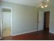 Spacious bedroom featuring an adjoining bathroom and hardwood floors for added convenience at 3803 Ridgewood Dr, Franklinton, NC 27525