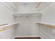 Walk-in closet with ample shelving for organization and storage at 3803 Ridgewood Dr, Franklinton, NC 27525