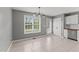 Bright dining area featuring tile floors and access to the backyard at 3803 Ridgewood Dr, Franklinton, NC 27525