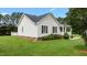 Well-maintained home featuring a neat lawn, charming porch, and vinyl siding at 3803 Ridgewood Dr, Franklinton, NC 27525
