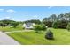 Charming home with a well-manicured lawn and mature landscaping at 3803 Ridgewood Dr, Franklinton, NC 27525