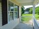 Covered front porch offering a view of the spacious front yard and surrounding neighborhood at 3803 Ridgewood Dr, Franklinton, NC 27525