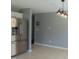 Spacious kitchen with stainless steel appliances, tile floors and gray walls at 3803 Ridgewood Dr, Franklinton, NC 27525