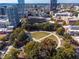 Aerial of downtown Raleigh with green space, city buildings and fall foliage at 409 E Lee St, Raleigh, NC 27601