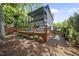 Spacious backyard deck with outdoor seating provides a perfect space for relaxation and entertainment at 409 E Lee St, Raleigh, NC 27601