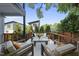 Outdoor deck with stylish seating and neighborhood views, perfect for relaxing and entertaining at 409 E Lee St, Raleigh, NC 27601